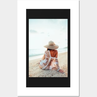 Elegant Woman Sitting on Beach and Watching the Ocean Posters and Art